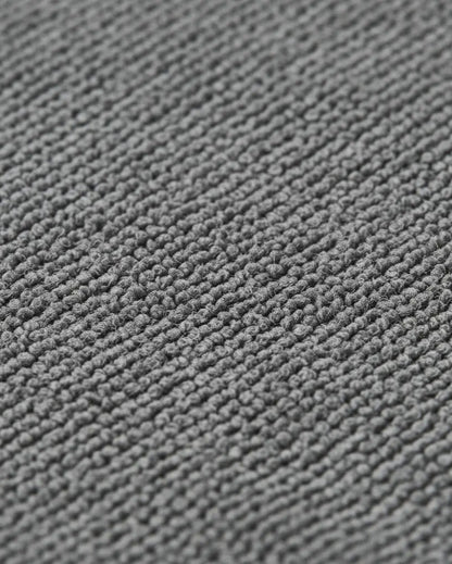 Foto con microfibra en el centro. Toalla microfibra super absorbente de alta tecnología. 